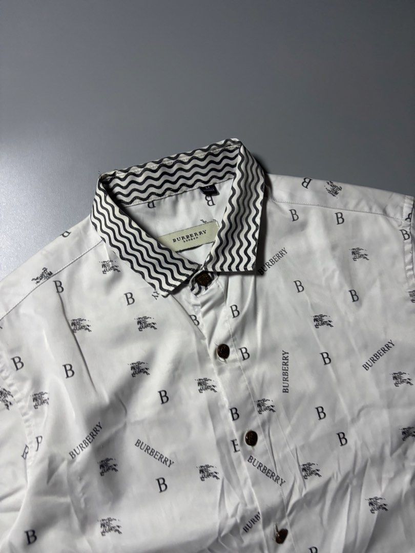 Burberry all over print button down (Category: Formal Shirts) located in Manila. Submitted by austinace04 (Listing ID 1460940708, Image 3). Description: - Excellent Condition - Size M On Tag - 19 x 27 - Issue None - 9.5x10 Color rate .