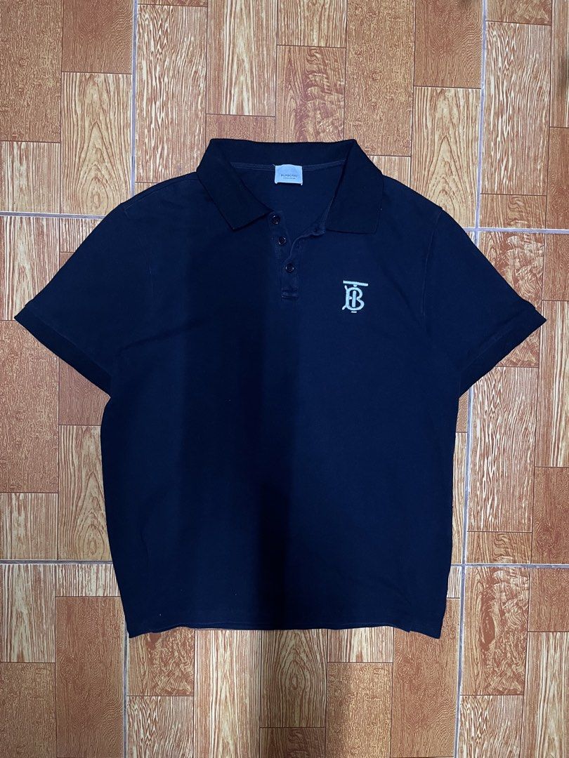 BURBERRY POLO (Category: Tshirts & Polo Shirts ) located in Surigao. Submitted by kevsdyz (Listing ID 1461038468, Image 1). Description: Burberry Width: 22 Length: 28 Condition: 9/10 Color Rate: 9/10 Issue: None.