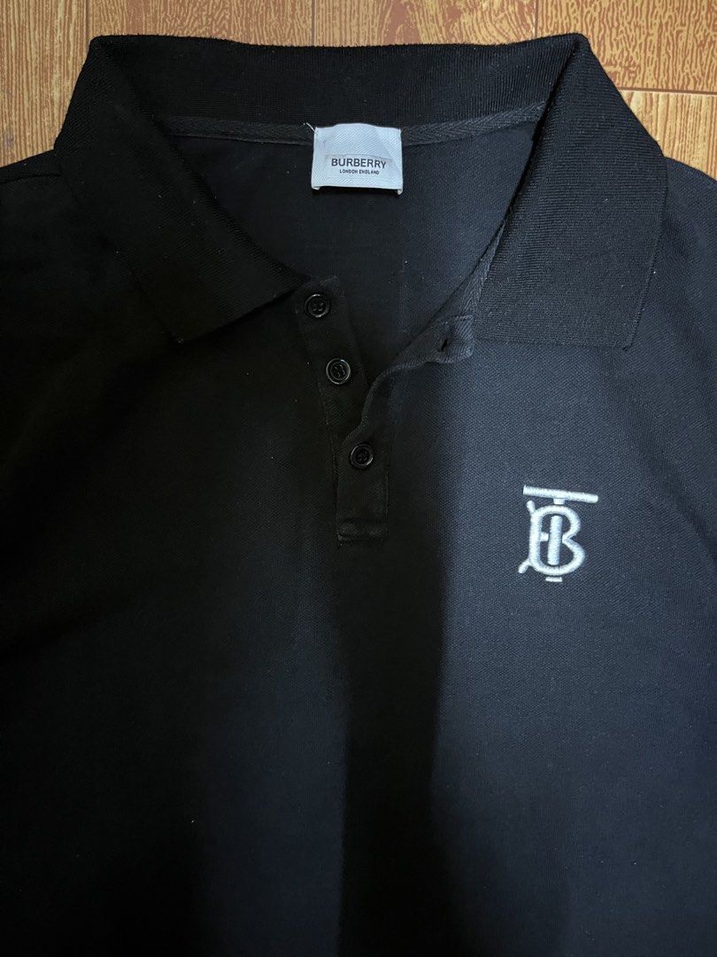 BURBERRY POLO (Category: Tshirts & Polo Shirts ) located in Surigao. Submitted by kevsdyz (Listing ID 1461038468, Image 2). Description: Burberry Width: 22 Length: 28 Condition: 9/10 Color Rate: 9/10 Issue: None.