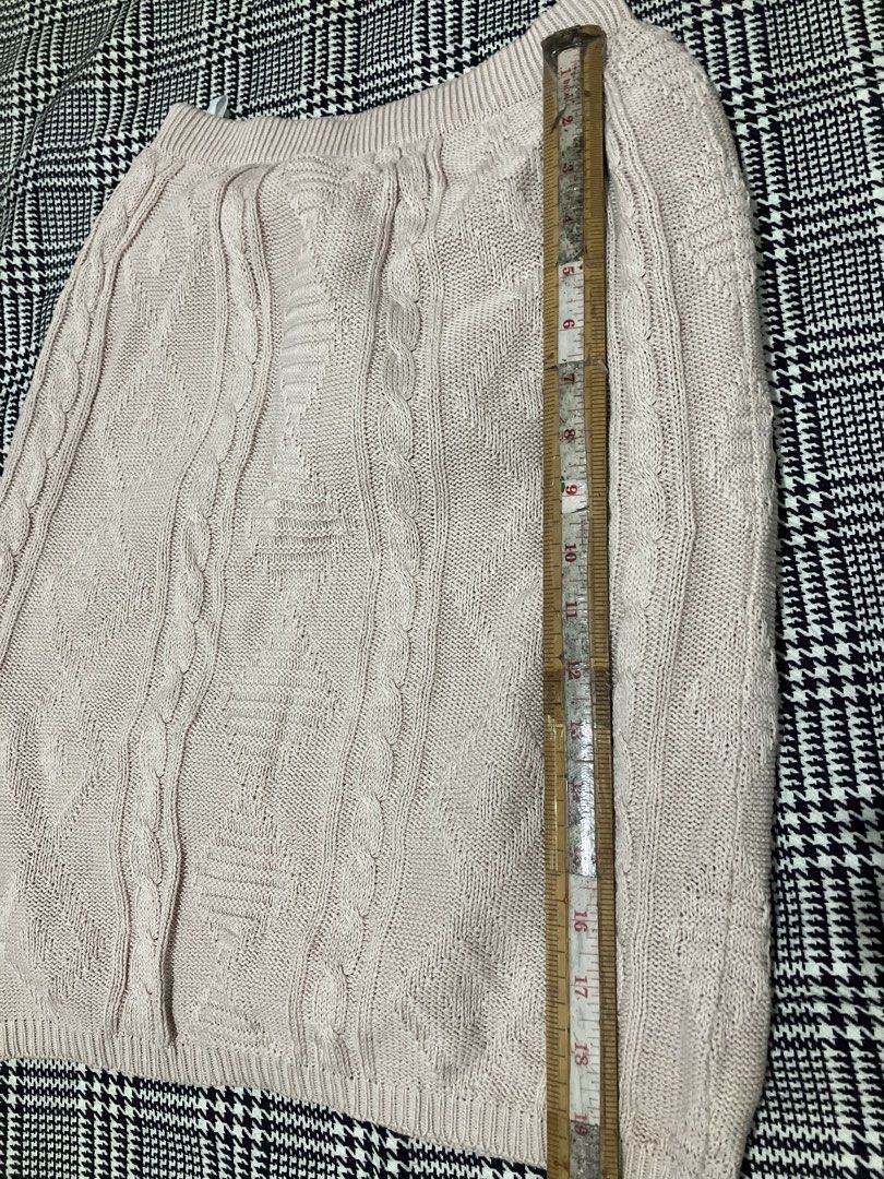 Cable-knit mini skirt (Category: Skirts) located in Angeles City. Submitted by jnwsurplus (Listing ID 1460997552, Image 3). Description: Plss see pictures for the size This is a beige cable-knit mini skirt featuring a classic vertical braided pattern and a ribbed hem. Add sf.