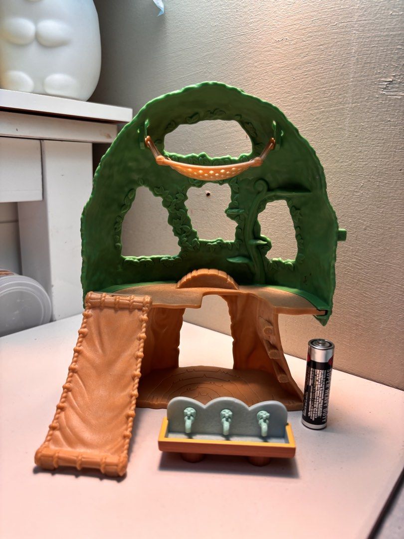 Calico Critters Tree House Playset with Accessories (Category: Kids Toys) located in Pasay City. Submitted by tindeclutterstuff (Listing ID 1461020122, Image 2). Description: - Calico Critters Treehouse Playset - Features a hammock, slide, and sink with faucets - Openings designed for critter play - Battery included (for scale reference) - Encourages imaginative play #sylvanian #critters #calico #dollhouse #sylvanianfamily #playset.
