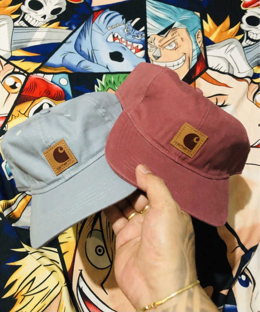 Carhartt Caps (2 pcs) (Category: Caps & Hats) located in Manila. Submitted by youngmoon_c2e10b (Listing ID 1461109058, Image 1). Description: Selling two Carhartt caps. One is grey, the other is a dusty rose color. Both have the classic Carhartt logo patch on the front. The inside shows the brand name embroidered on the strap. Great for everyday wear. Grab both for a good deal..