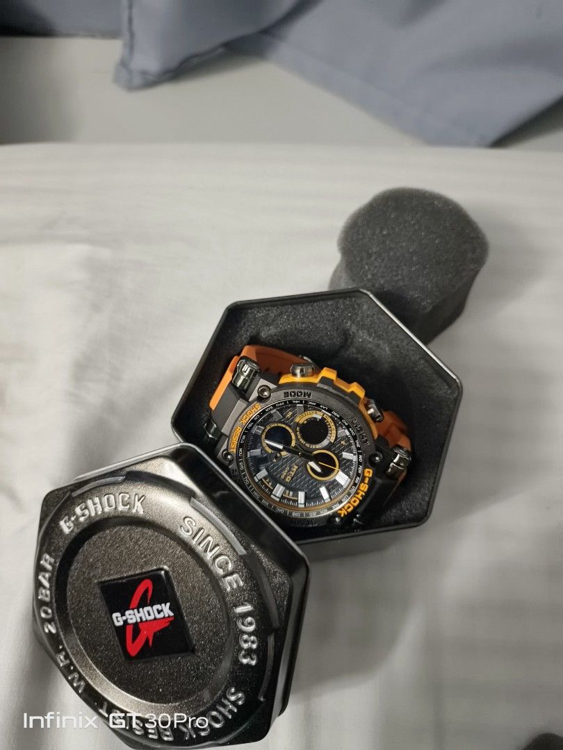 Casio G-Shock MT-G Watch (Category: Men's Watches) located in Bacoor. Submitted by aaronthefirst (Listing ID 1461107472, Image 2). Description: - G-Shock MT-G watch - Striking black and orange colorway - Features multiple dials and functions - Comes with its original tin box - Ideal for everyday wear or for watch collectors - Top Grade Quality.