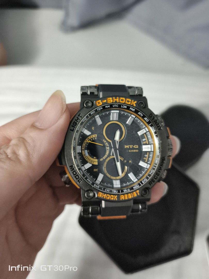 Casio G-Shock MT-G Watch (Category: Men's Watches) located in Bacoor. Submitted by aaronthefirst (Listing ID 1461107472, Image 1). Description: - G-Shock MT-G watch - Striking black and orange colorway - Features multiple dials and functions - Comes with its original tin box - Ideal for everyday wear or for watch collectors - Top Grade Quality.