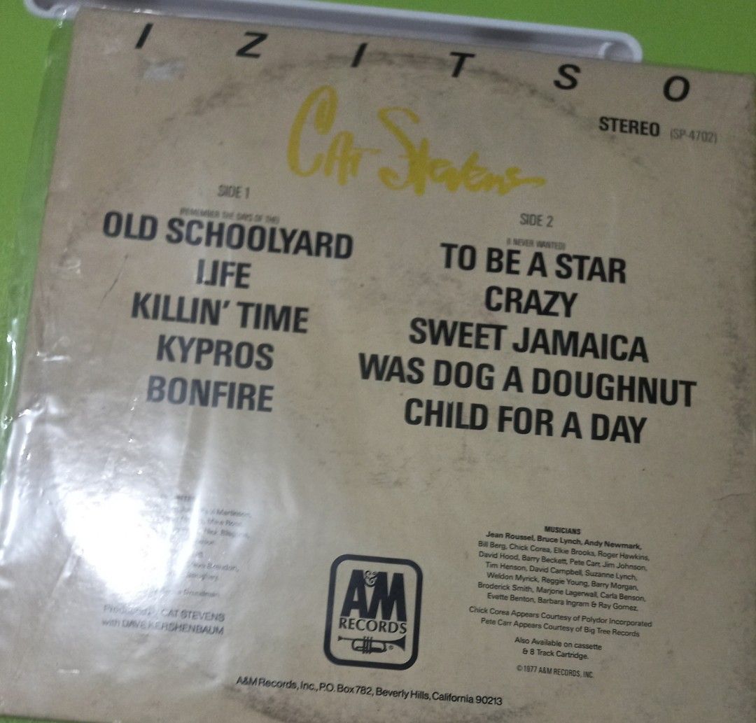 Cat Stevens Izitso Vinyl Record A&M Records SP-4702 (Category: Vinyls) located in Makati City. Submitted by rnst1 (Listing ID 1460950458, Image 2). Description: - Cat Stevens 'Izitso' Vinyl Record - Original A&M Records pressing (SP-4702) - Copyright 1977 - Features popular tracks: 'Old Schoolyard', 'Life', 'To Be A Star', 'Was Dog A Doughnut', and more. - Produced by Cat Stevens and Dave Kershenbaum - Stereo format - A collector's gem for any mu