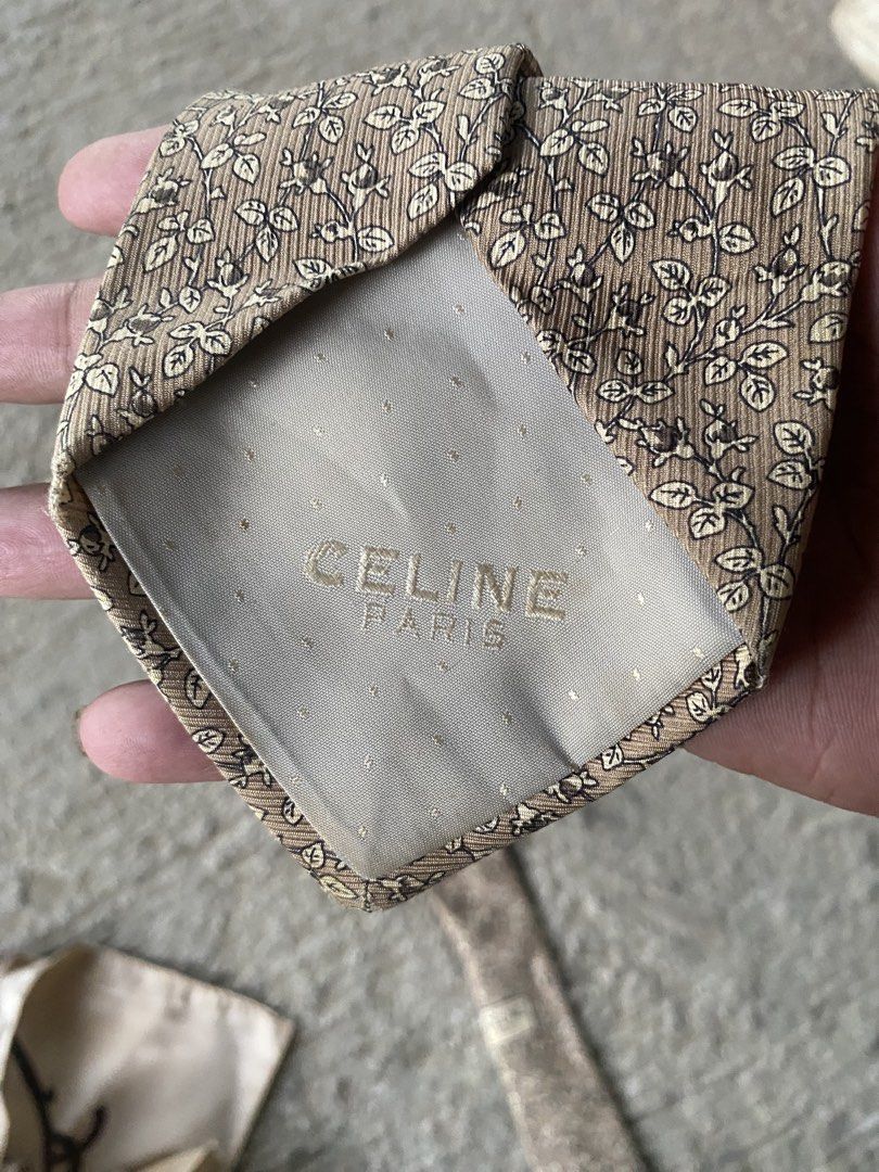 Celine Paris Pure Silk Tie (Category: Ties) located in Zamboanga. Submitted by trippsnthrifts (Listing ID 1461087637, Image 3). Description: - Authentic Celine Paris tie - Crafted from 100% pure silk - Features a subtle floral pattern in beige and brown - Proudly made in Spain - An elegant accessory to elevate any formal outfit.