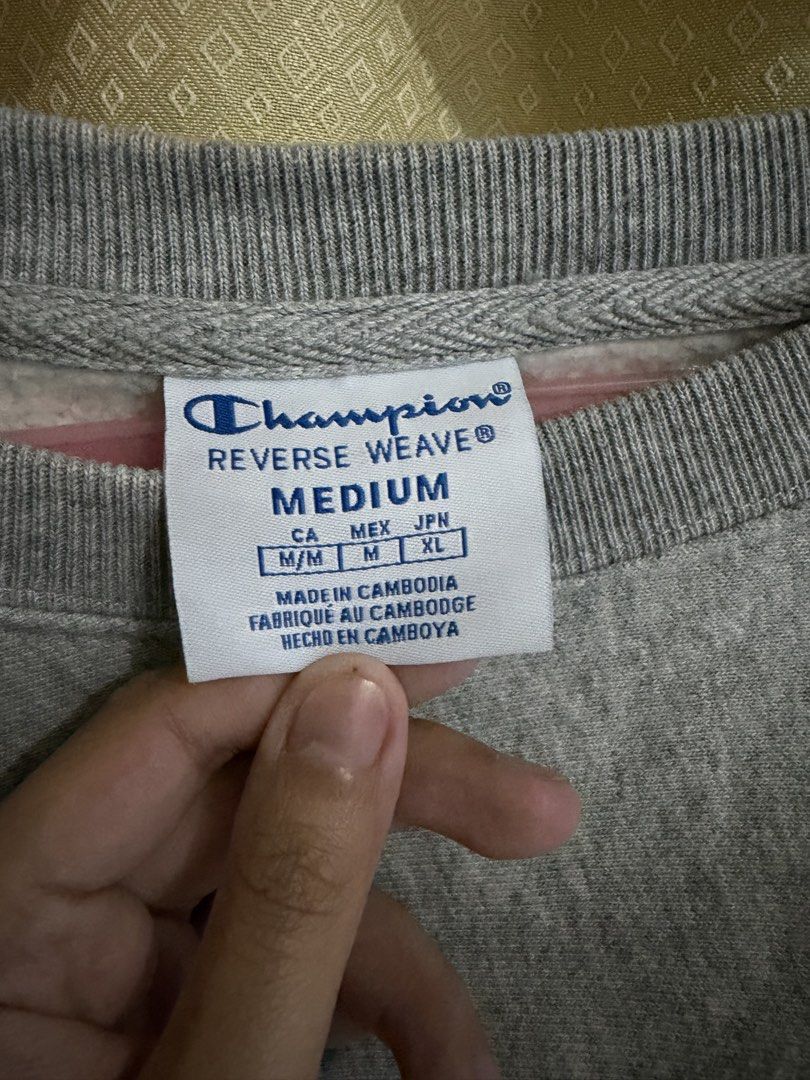 Champion Grey Cropped Sweatshirt (Category: Longsleeves) located in Quezon City. Submitted by m.angelaaa (Listing ID 1461104554, Image 2). Description: - Grey Champion Reverse Weave cropped sweatshirt - Features Champion logo on front and back - Size: Medium - Made in Cambodia.