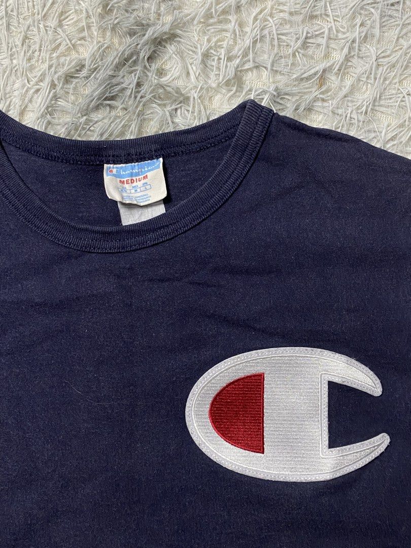 Champion Tee (Category: Tshirts & Polo Shirts ) located in Santa Rosa. Submitted by 415_thriftss (Listing ID 1461038017, Image 2). Description: Champion Tshirt ✅ Available - Medium On tag - Good condition 🔽DETAILS - Condition: 8.8/10 - Dimes: 19 Width x 27 Length - Color rate: 8.8/10 - Issue: No patch sleeve ———————————— 🏷️ M / Mine: 180 + Shipping fee.