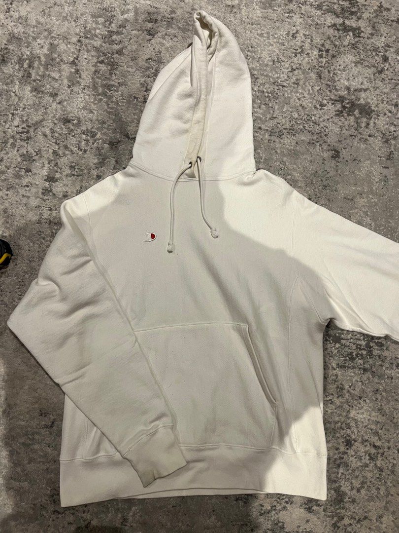 Champion White Hoodie (Category: Hoodies) located in Quezon City. Submitted by purplepproni (Listing ID 1461006662, Image 1). Description: - Classic white Champion hoodie - Features iconic small C logo on the chest - Front kangaroo pocket - Adjustable drawstring hood - Ribbed cuffs and hem for a snug fit - Ideal for casual, everyday style.