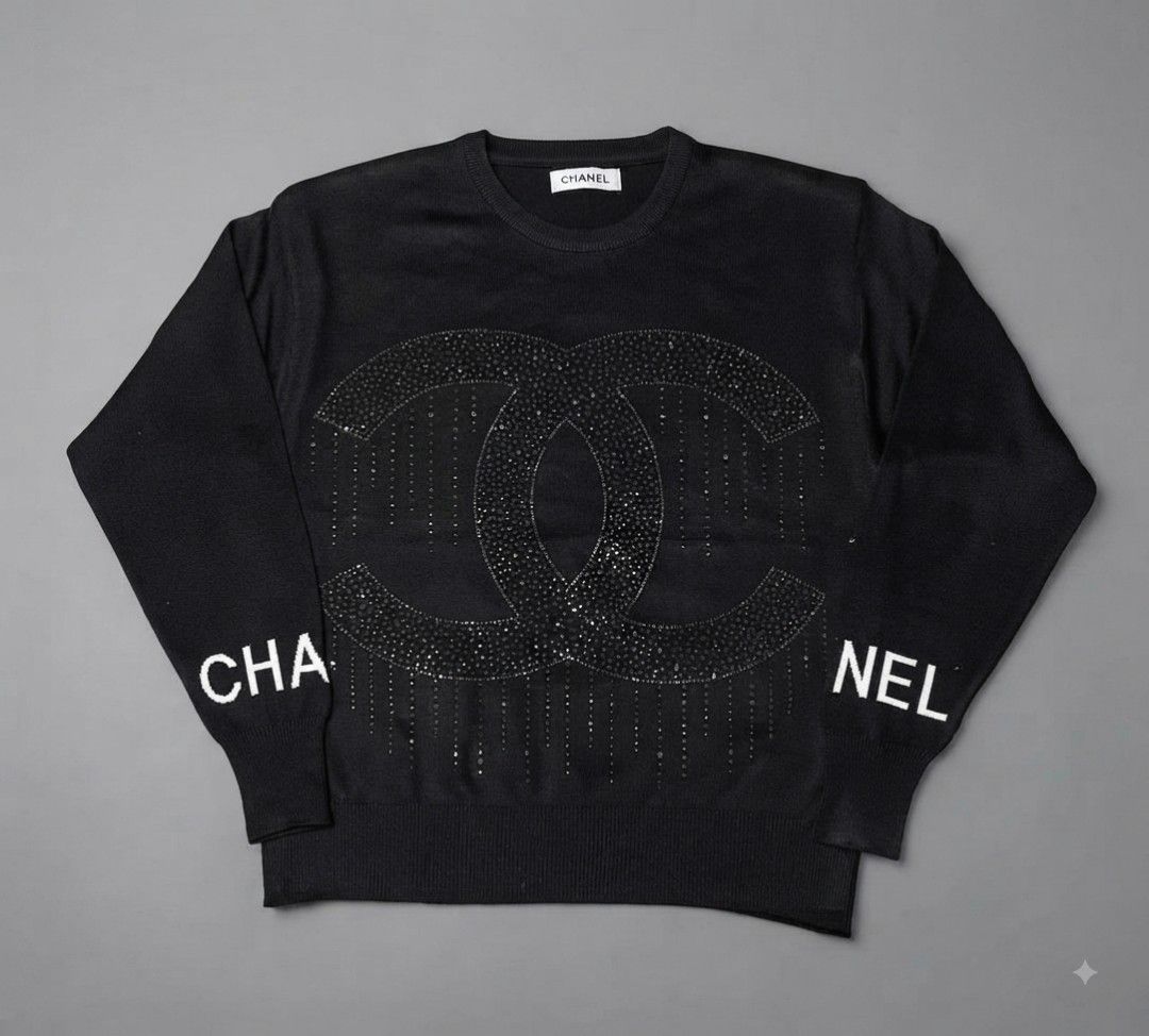 Chanel Black Embellished CC Logo Sweater (Category: Coats, Jackets and Outerwear) located in Manila. Submitted by heavenlyclo05 (Listing ID 1461045968, Image 1). Description: CHANNEL KNITTED SWEATER Size medium Width: 20.5 Length: 24.5 Very Good Condition No issue.