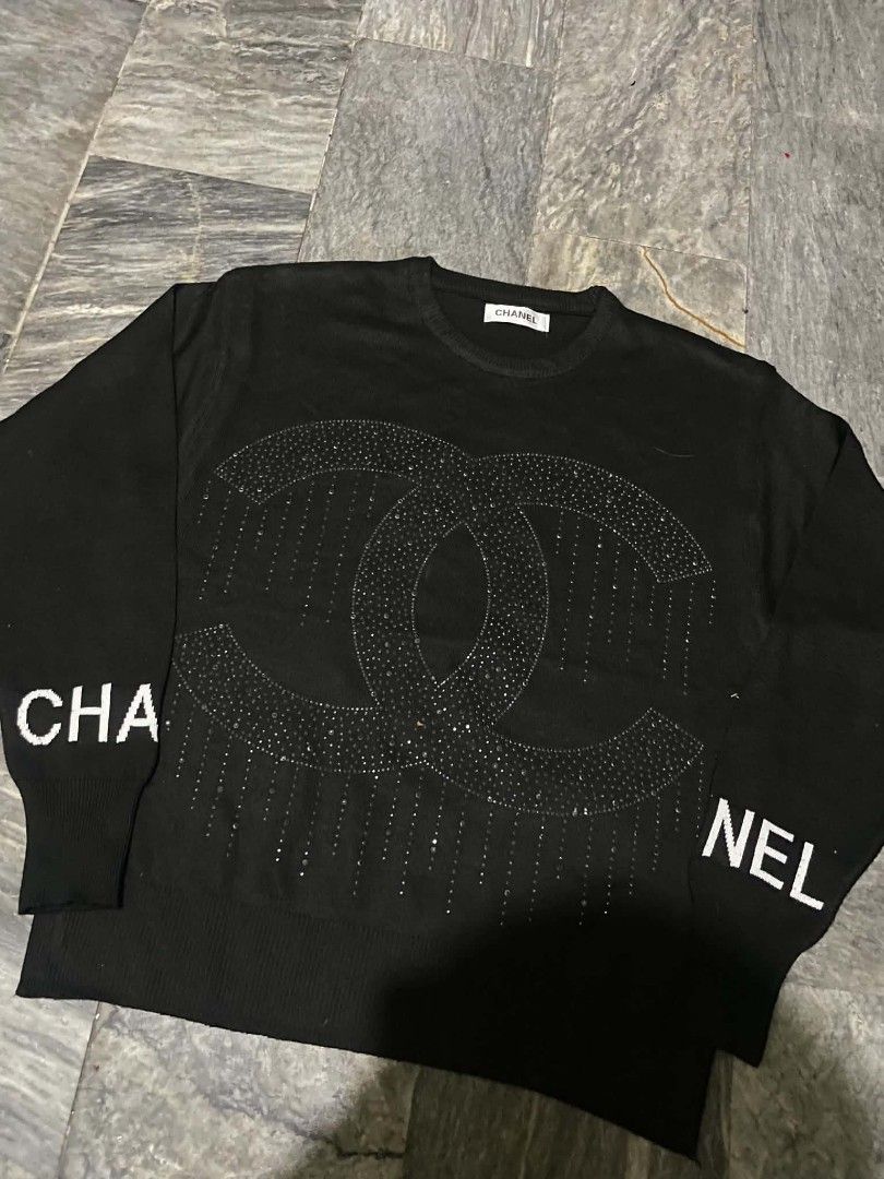 Chanel Black Embellished CC Logo Sweater (Category: Coats, Jackets and Outerwear) located in Manila. Submitted by heavenlyclo05 (Listing ID 1461045968, Image 2). Description: CHANNEL KNITTED SWEATER Size medium Width: 20.5 Length: 24.5 Very Good Condition No issue.