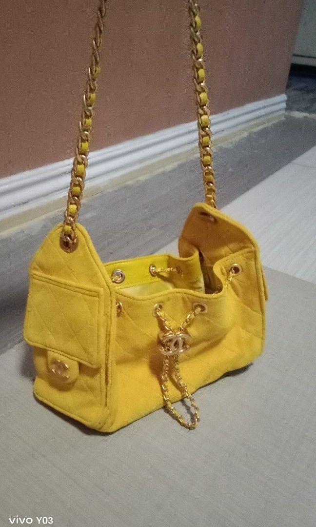 Chanel chain bag micro chip (Category: Cross-body Bags) located in Cabuyao City. Submitted by selections888 (Listing ID 1461078216, Image 2). Description: preloved from Japan supplier color yellow medium size with made and serial chanel engrave on hardware expect signs of use as preloved still in good condition still very presentable for daily use.