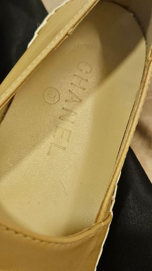 Chanel Espadrilles Beige Black Size 39 (Category: Flats & Sandals) located in Manila. Submitted by maria28isabelle (Listing ID 1461030761, Image 3). Description: - Classic Chanel espadrilles - Color: Beige leather with black cap toe - Features: Signature CC logo on vamp, jute rope trim - Origin: Made in Spain - Size: 39 - Includes: Original dust bag.