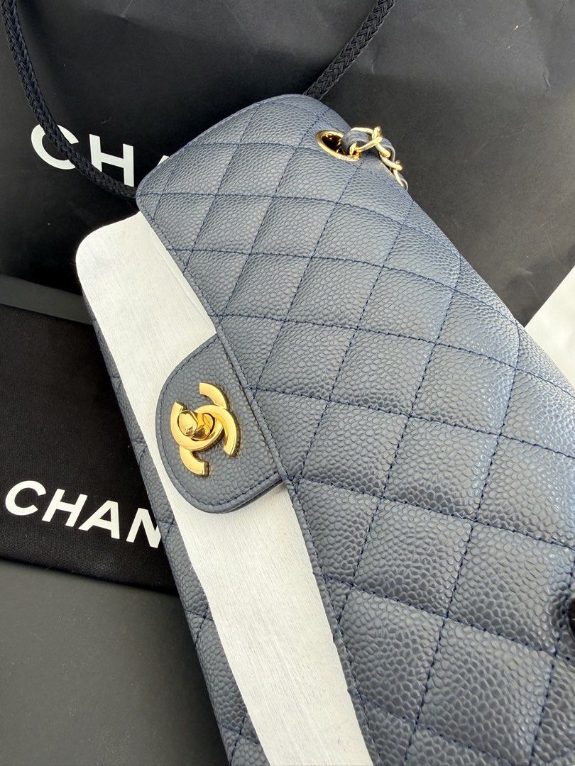 Chanel small flap caviar (Category: Shoulder Bags) located in Cebu City. Submitted by imrcemj (Listing ID 1461043854, Image 1). Description: Chanel small flap 💯caviar leather material in rare color : (greyish blue/ slight black ) 23cm .