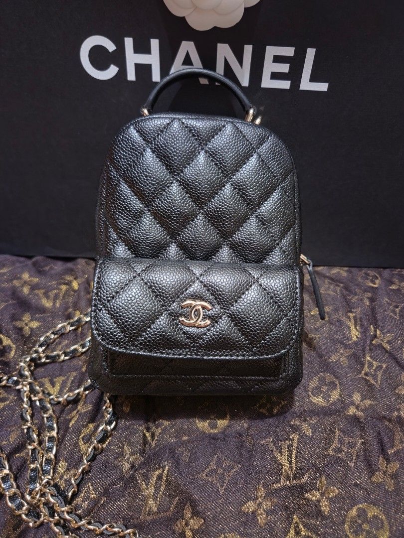 Chanel Vanity Case Bag with Card Holder (Category: Luxury Bags & Wallets) located in Pasig City. Submitted by sashasarisarishoppe (Listing ID 1460973121, Image 1). Description: - Japan Surplus Chanel black caviar leather vanity case - Includes matching card holder - Elegant gold hardware details - Secure zipper closure for main compartment - Luxurious burgundy fabric interior lining - Expertly crafted in Italy - Ideal size for carrying your daily