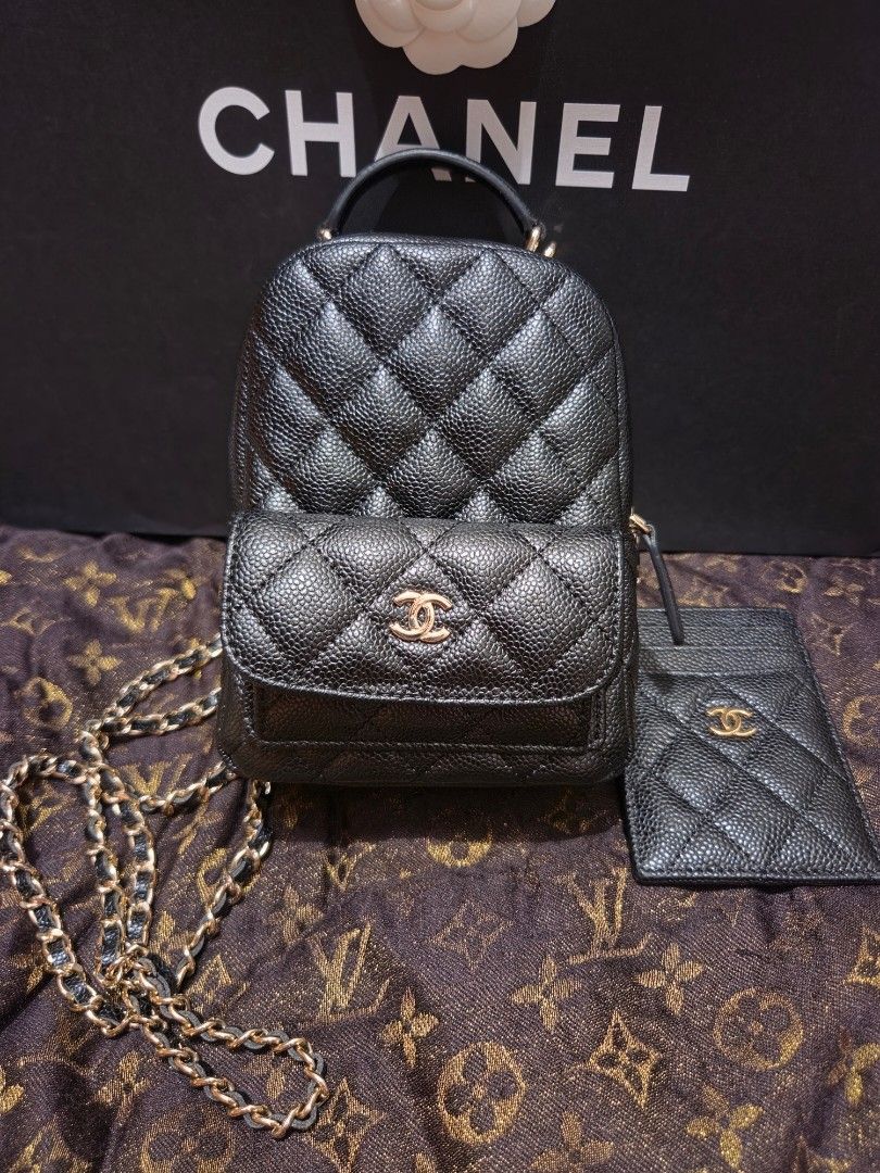 Chanel Vanity Case Bag with Card Holder (Category: Luxury Bags & Wallets) located in Pasig City. Submitted by sashasarisarishoppe (Listing ID 1460973121, Image 2). Description: - Japan Surplus Chanel black caviar leather vanity case - Includes matching card holder - Elegant gold hardware details - Secure zipper closure for main compartment - Luxurious burgundy fabric interior lining - Expertly crafted in Italy - Ideal size for carrying your daily