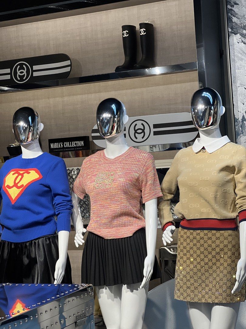 Chanel x Superman Blue Knit Sweater (Category: Luxury Apparel) located in Quezon City. Submitted by marias8230 (Listing ID 1461008038, Image 2). Description: - Stylish blue knit sweater - Features iconic Chanel logo reimagined as Superman's emblem - Long sleeves and classic crew neck - Versatile: pairs well with skirts or trousers - A standout piece for any fashion-forward individual.
