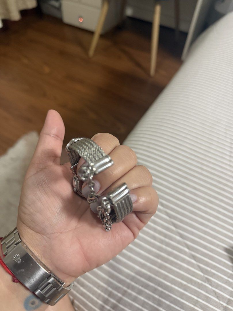 Charriol st Tropez Watch (Category: Luxury Watches) located in Rizal. Submitted by nhacio06 (Listing ID 1460926928, Image 3). Description: Charriol ST-TROPEZ® 25mm watch steel cable bracelet version with the classic diamond/stone hour markers - Classic cable design - Mother-of-pearl dial - Silver tone finish - Ideal for everyday wear - Beautiful and elegant piece - Feel free to ask any questions With box and card Slightly negotiable.