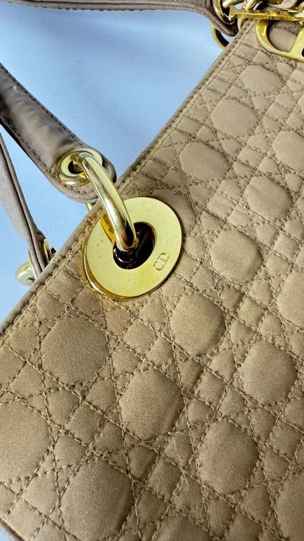 Christian Dior Trotter Shoulder Bag (Category: Luxury Bags & Wallets) located in Pasig City. Submitted by dertah (Listing ID 1461036790, Image 3). Description: - Authentic Christian Dior shoulder bag - Iconic Trotter pattern - Color: Tan - Hardware: Gold - Interior: Multiple compartments - Strap condition: Good - A timeless classic piece -100% Japan -100% Authentic -In pristine condition with a minimal sign of use -Clean, elegant, classy, vintage