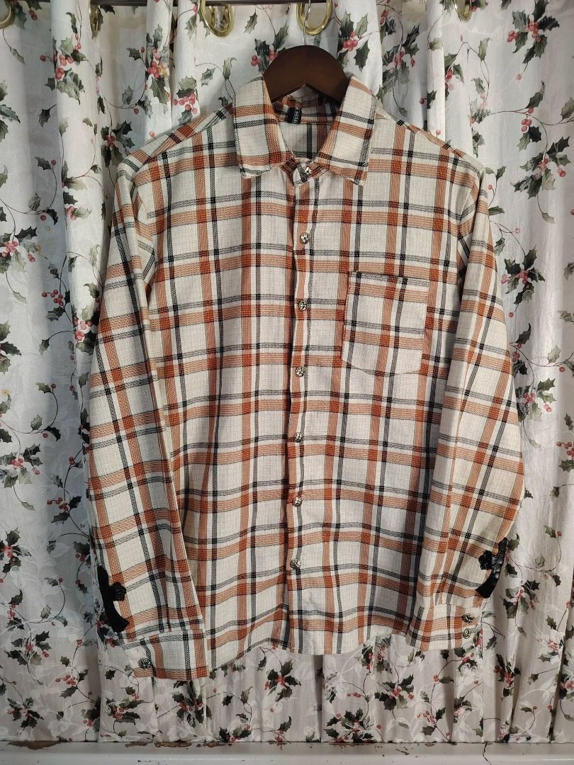 CHROMEHEARTS MATTY BOY FLANNEL SNAPBUTTON DOWN LONGSLEEVES // Large (Category: Luxury Apparel) located in Legazpi City. Submitted by urbangarmentsarch4500 (Listing ID 1460936373, Image 3). Description: CHROMEHEARTS MATTY BOY FLANNEL SNAPBUTTON DOWN LONGSLEEVES // Large Excellent Condition Large W 21 L 28 Print 10/10 Missing 1 sleeve button minimal loose stitch neck (Check last pic) Color rate 10/10 --- ‼️w/ FREE STICKERS FOR EVERY PURCHASE⁉️ 🛒🛒