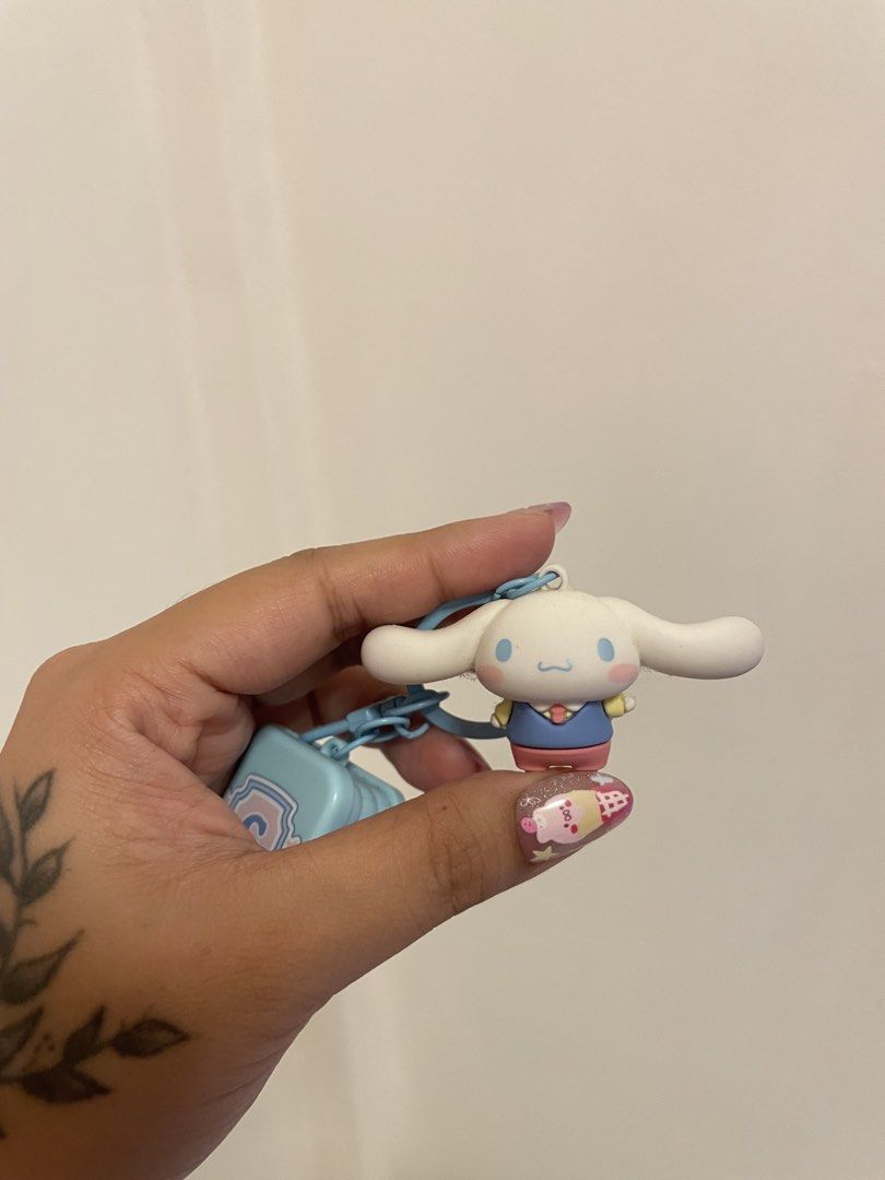 Cinnamoroll Keychain with Blue Suitcase Charm (Category: Character Goods) located in Iba. Submitted by wealtheallymari99 (Listing ID 1461084411, Image 2). Description: - Adorable Cinnamoroll keychain - Includes a cute mini blue suitcase charm - Perfect accessory for bags and keys - Ideal gift for Sanrio fans - Made with durable material - Easy to attach.