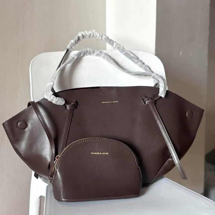 C&K Calla tote (Category: Shoulder Bags) located in Bulacan. Submitted by mykakarizza (Listing ID 1461108159, Image 1). Description: CALLA RESTOCK✨✨ ₱950 onlyy C&K Calla tote Strap drop length 31 cm Strap length 66 cm Width 18-40 cm Depth 10 cm Height 23 cm Add paperbag 100 📸 Actual pics! 🙋🏻‍♀️ ─── ✦ ─── ✦ ─── ✦ ─── ✦ ─── 🛍️ LOOKING FOR MORE RESELLERS 🛍️ ✨ Buy 3 pcs of ANY items — FREE SHIPPING NA!🚚 ✨ Buy 10 items → FREE SF + ₱50 OFF EACH! 
