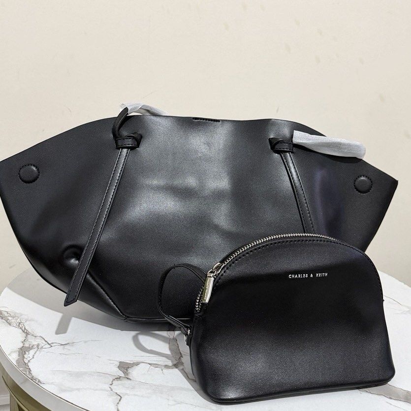 C&K Calla tote (Category: Tote Bags) located in Bulacan. Submitted by mykakarizza (Listing ID 1461108187, Image 2). Description: CALLA RESTOCK✨✨ ₱950 onlyy C&K Calla tote Strap drop length 31 cm Strap length 66 cm Width 18-40 cm Depth 10 cm Height 23 cm Add paperbag 100 📸 Actual pics! 🙋🏻‍♀️ ─── ✦ ─── ✦ ─── ✦ ─── ✦ ─── 🛍️ LOOKING FOR MORE RESELLERS 🛍️ ✨ Buy 3 pcs of ANY items — FREE SHIPPING NA!🚚 ✨ Buy 10 items → FREE SF + ₱50 OFF EACH! 💖 P