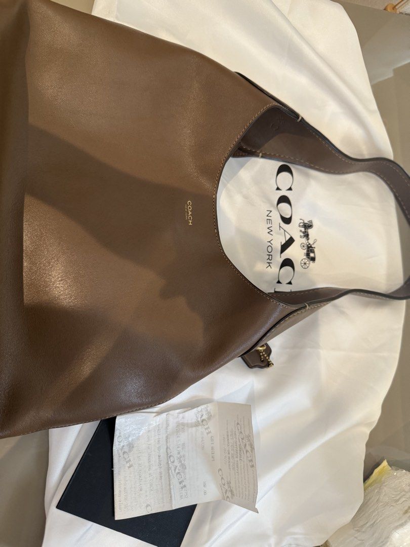 Coach Brooklyn28 in Dark Stone (Category: Luxury Bags & Wallets) located in Del Monte. Submitted by jdyhianto (Listing ID 1460958473, Image 2). Description: - Authentic Coach Hobo Bag - Color: Dark Stone - Material: Genuine Leather - Design: Simple and Classic - Perfect for everyday use - Includes original dust bag - Comes with gift receipt.