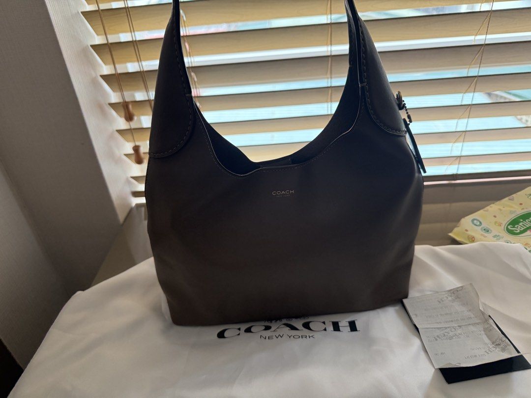 Coach Brooklyn28 in Dark Stone (Category: Luxury Bags & Wallets) located in Del Monte. Submitted by jdyhianto (Listing ID 1460958473, Image 1). Description: - Authentic Coach Hobo Bag - Color: Dark Stone - Material: Genuine Leather - Design: Simple and Classic - Perfect for everyday use - Includes original dust bag - Comes with gift receipt.