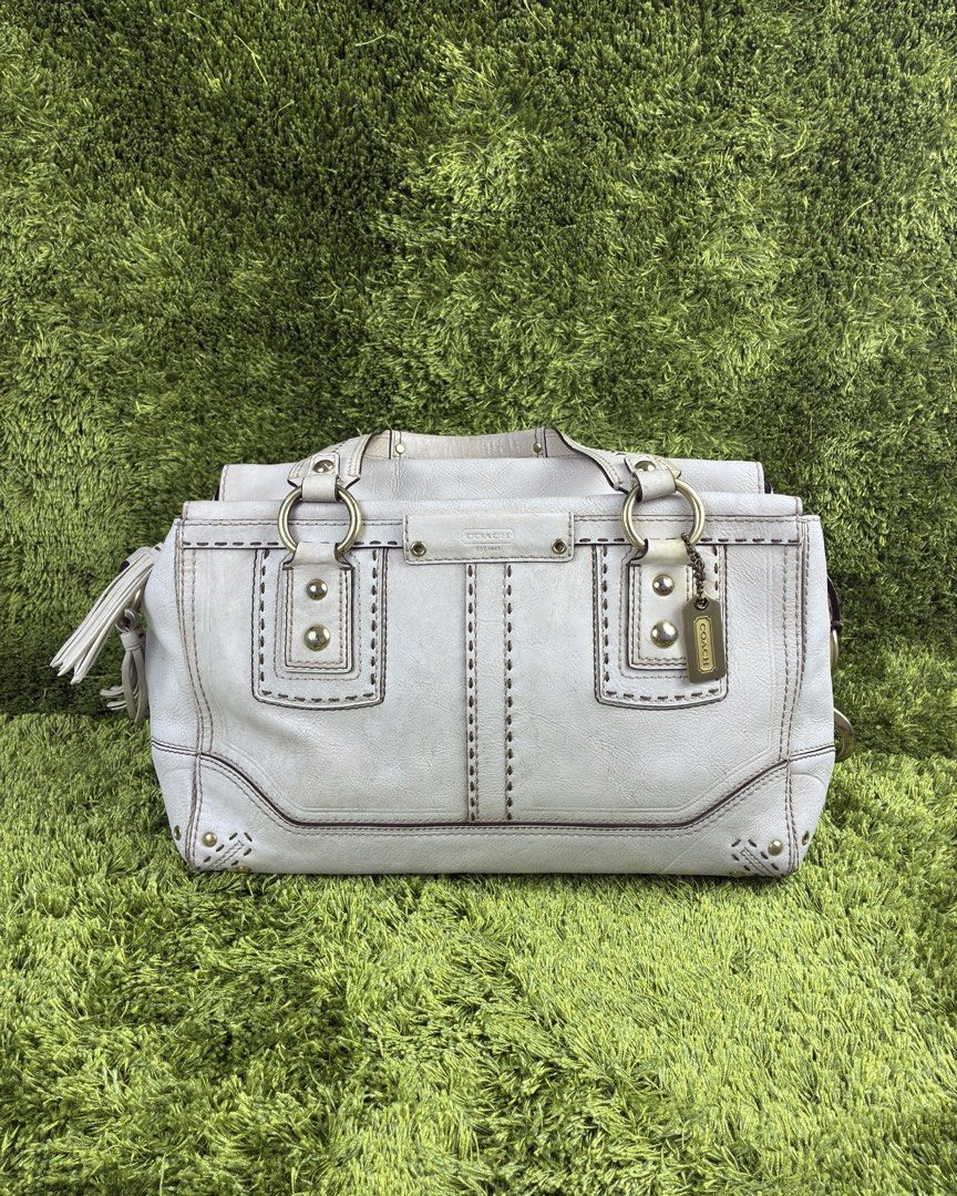Coach Hamptons Andrea Satchel Bag (Category: Luxury Bags & Wallets) located in Lucena. Submitted by shopdotmane (Listing ID 1461058294, Image 1). Description: Vintage Coach 65th Anniversary Hamptons Andrea Satchel in White Leather Condition - 8.5/10 Signs of usage Still very presentable, clean and rehydrate nyo lang yung leather .
