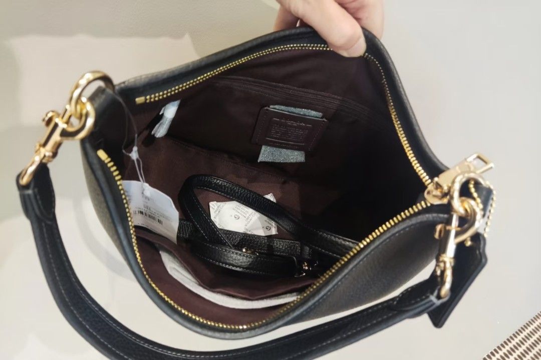 Coach Laurel Black (Category: Shoulder Bags) located in Pasig City. Submitted by maryjanegr (Listing ID 1460959321, Image 3). Description: 🍒 OG from Factory Outlet 🍒 Complete with Dustbag, Paperbag, and Care Card 🍒 Taguig Location.