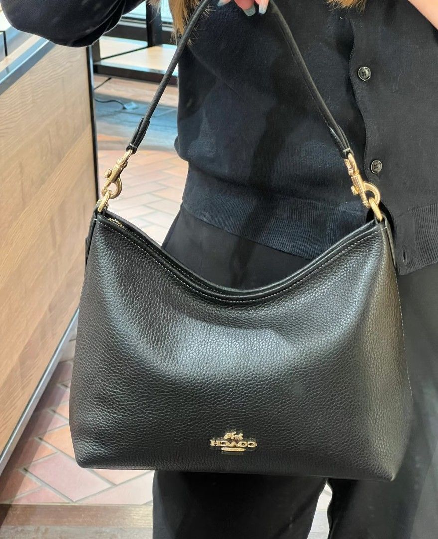 Coach Laurel Black (Category: Shoulder Bags) located in Pasig City. Submitted by maryjanegr (Listing ID 1460959321, Image 1). Description: 🍒 OG from Factory Outlet 🍒 Complete with Dustbag, Paperbag, and Care Card 🍒 Taguig Location.