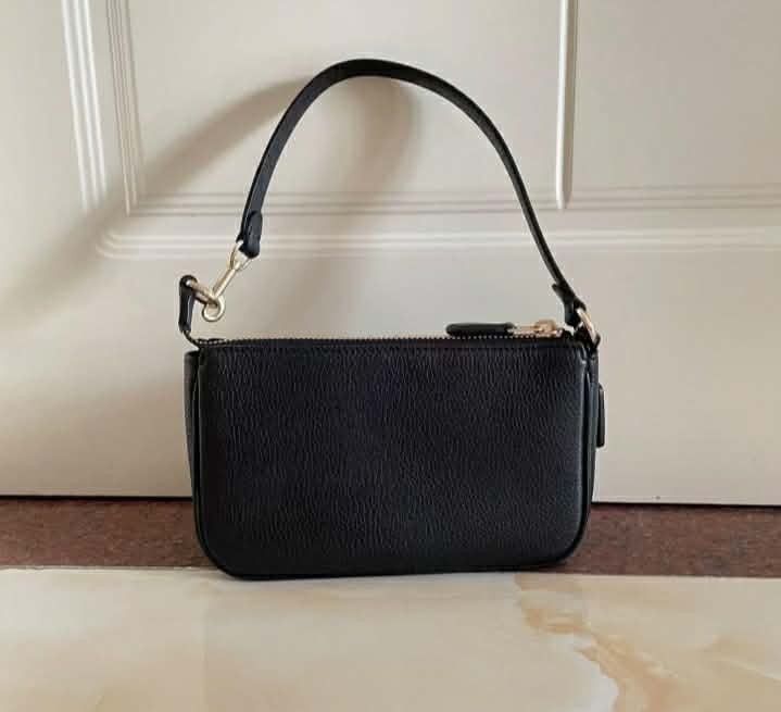 COACH NOLITA 19 BLACK( pretty) (Category: Luxury Bags & Wallets) located in Pasig City. Submitted by ttitalaana20198 (Listing ID 1460986454, Image 2). Description: DUST BAG / PAPER BAG NO MEET UP PAYMENT FIRST POLICY🖤.