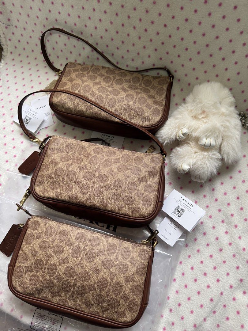 Coach plaza (Category: Luxury Bags & Wallets) located in Carmona. Submitted by outletshopper.ph (Listing ID 1460979634, Image 2). Description: - Authentic Coach shoulder bag - Classic monogram print with brown leather trim - Secure zipper closure - Comes with original tags - Ideal for everyday use - Multiple quantities available.