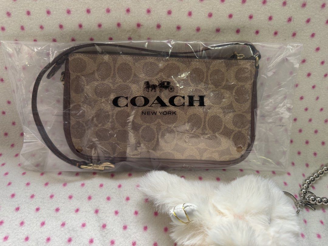 Coach plaza (Category: Luxury Bags & Wallets) located in Carmona. Submitted by outletshopper.ph (Listing ID 1460979634, Image 3). Description: - Authentic Coach shoulder bag - Classic monogram print with brown leather trim - Secure zipper closure - Comes with original tags - Ideal for everyday use - Multiple quantities available.
