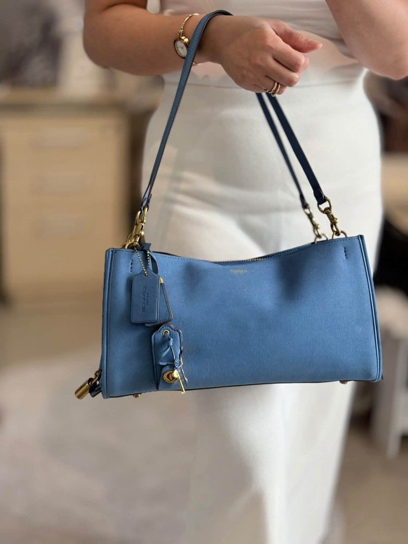 Coach Rogue 34 in Blue (Category: Cross-body Bags) located in Quezon City. Submitted by bagsboutiqueph (Listing ID 1460952500, Image 2). Description: LAST PRICE POSTED. LIMITED STOCKS! BRANDNEW WITH INCLUSIONS. COLOR MAY SLIGHTLY VARY IN ACTUAL DUE TO LIGHTING AND CAMERA SETTING. OTHER PHOTOS WILL BE SEND DURING PURCHASE AND FOR SURE BUYERS ONLY. WHEN IN DOUBT, DO NOT ORDER. THANK YOU..