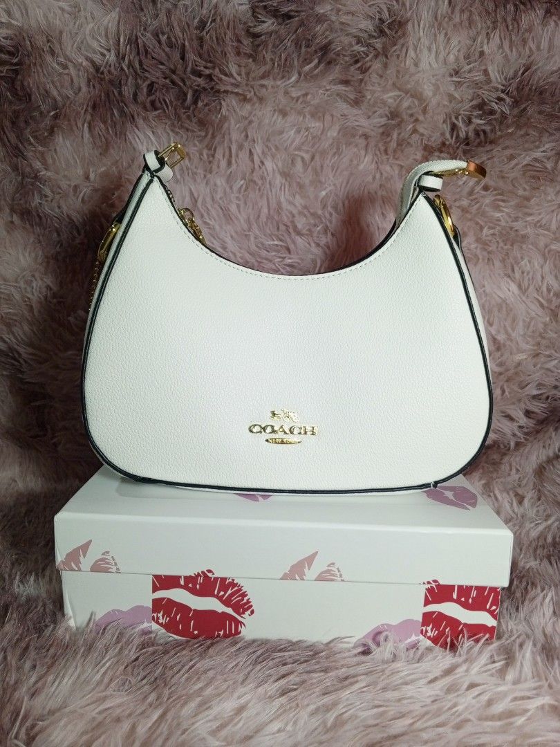 Coach White Leather Hobo Shoulder Bag (Category: Shoulder Bags) located in Lucena. Submitted by jl_finds_thrift (Listing ID 1460934492, Image 1). Description: inclusions: box &dust bag loc: lucena city open for unli vc and vouch.