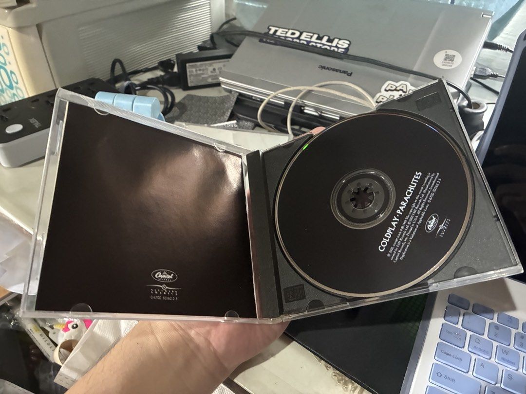 Coldplay - Parachutes (2000) (Category: CDs & DVDs) located in Quezon City. Submitted by yehonathansbox (Listing ID 1460962153, Image 2). Description: This is a preloved copy of Coldplay’s debut album. CD is in overall good condition with little to no marks on the disc .