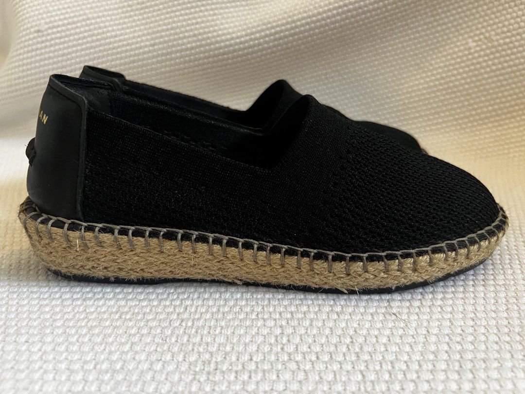 Cole Haan Black Cloudfeel Espadrille (Category: Flats & Sandals) located in Muntinlupa City. Submitted by wee_n_mutsi (Listing ID 1460942858, Image 3). Description: - Cole Haan espadrille flats in classic black. - Comfortable knit upper with elegant leather heel accents. - Stylish jute detailing along the sole. - Effortless slip-on design for convenience. - Perfect for everyday wear. - Size 6.5B - Barely used, very good condition, no box.