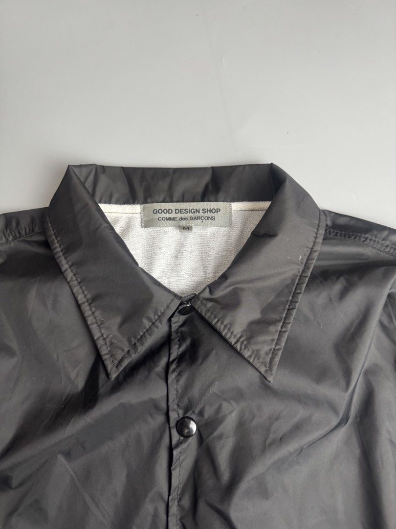 Comme Des Garcons - Coach Jacket (Category: Coats, Jackets and Outerwear) located in San Pablo. Submitted by hiddenrygn (Listing ID 1461050685, Image 3). Description: Comme Des Garcons - Coach Jacket Size : Medium (23” 28”) Minor flaws Pin hole at the back on letter D Still in excellent condition DM!.