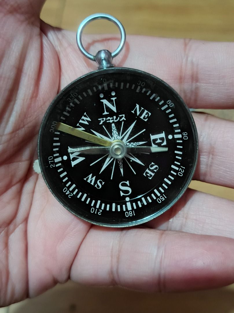 Compass Bundle (Category: Vintage Collectibles) located in Makati City. Submitted by nyxhemera26 (Listing ID 1460990251, Image 2). Description: Compass Bundle - Pocket compass with metal casing and keychain loop. - Traditional gold-colored Chinese Feng Shui Luopan with intricate markings. - Both compasses are fully functional. - Ideal for collectors, navigation enthusiasts, or those interested in traditional practices. - Sold as a set..