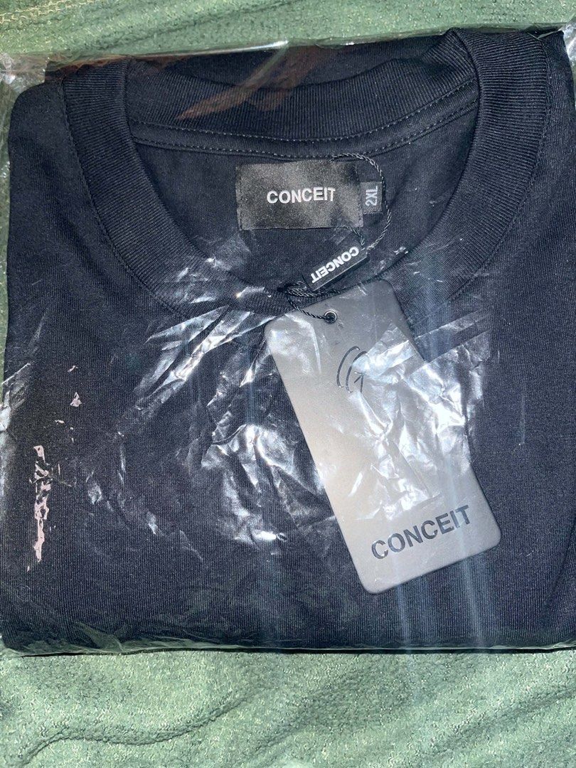 CONCEIT Black Logo Tee (Category: Tshirts & Polo Shirts ) located in Marikina City. Submitted by trix46 (Listing ID 1460982569, Image 2). Description: - Brand: CONCEIT - Color: Black - Size: 2XL (Local Size, fits Uniqlo Large) - Condition: Brand new, in original packaging with tags .