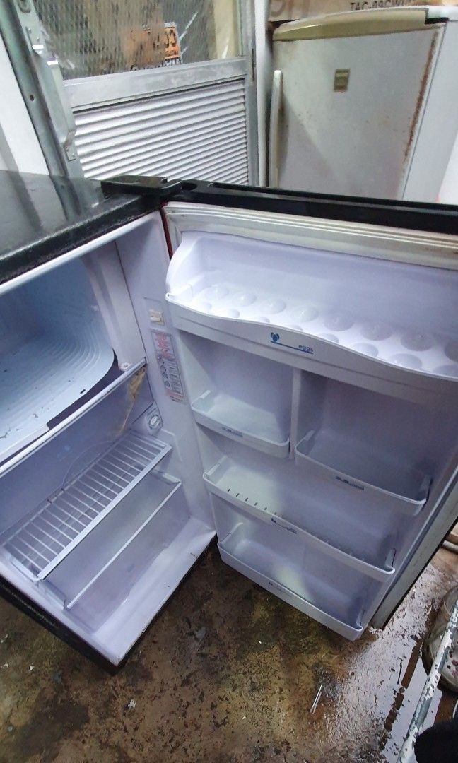 Condo-brand Red and Black Mini Fridge (Category: Refrigerators and Freezers) located in Taguig. Submitted by ldmagno (Listing ID 1461078993, Image 3). Description: - Condura brand red and black mini fridge - Ideal for dorm rooms or small spaces - Works well - For Pick up only.