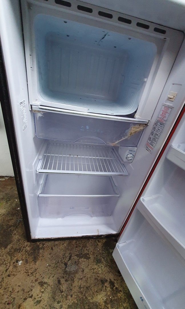 Condo-brand Red and Black Mini Fridge (Category: Refrigerators and Freezers) located in Taguig. Submitted by ldmagno (Listing ID 1461078993, Image 2). Description: - Condura brand red and black mini fridge - Ideal for dorm rooms or small spaces - Works well - For Pick up only.