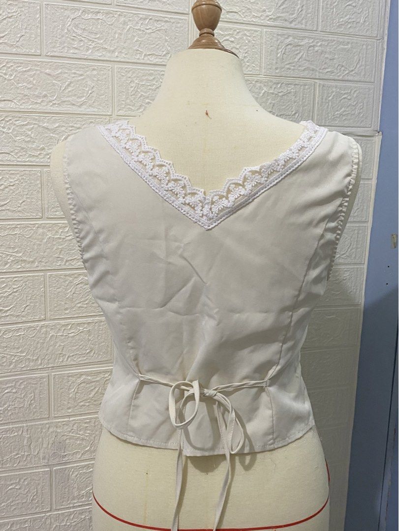 Coquette Beige Blouse Sleeveless Top (Category: Blouses) located in Manila. Submitted by junsakura (Listing ID 1460955816, Image 2). Description: M size! - supposed to where in thai but wasnt my aesthetic! - fashion student owned - lalamove or taft meetup I give freebies 🤍.