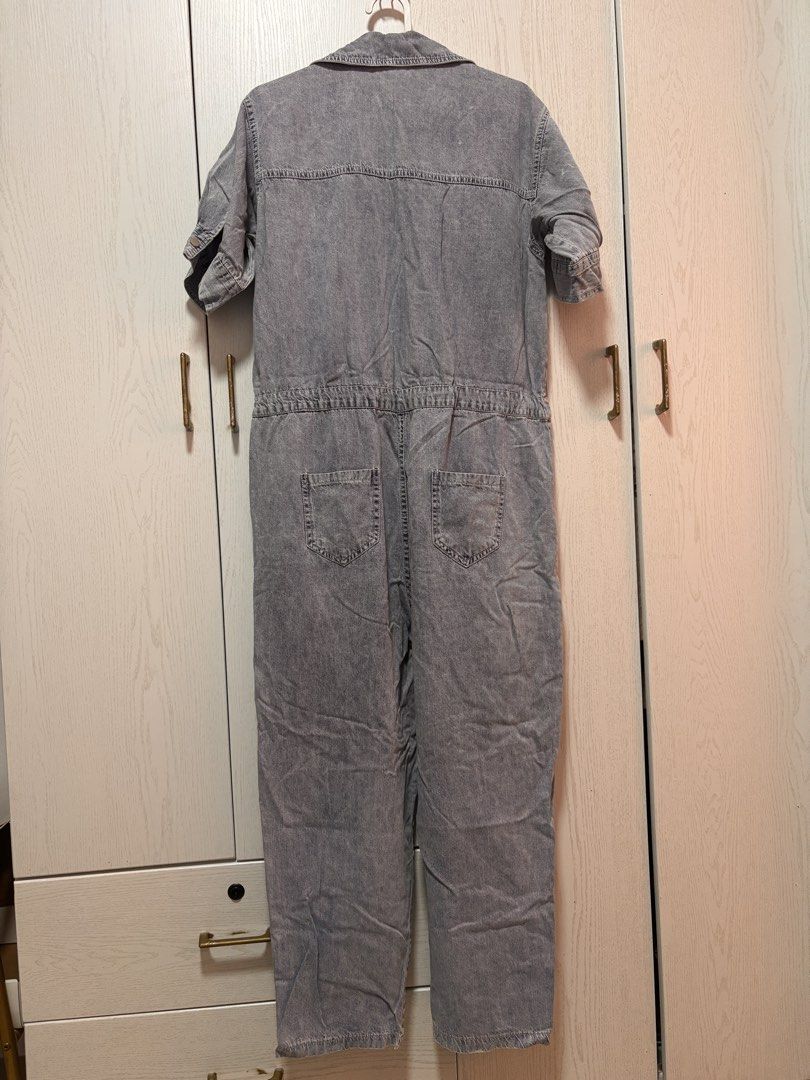 Cotton Denim Jumpsuit with Drawstring Waist (Category: Jumpsuits) located in Manila. Submitted by sophiadaphne (Listing ID 1460930991, Image 3). Description: - Stylish denim jumpsuit - Short sleeves with button detail - Adjustable drawstring waist for a perfect fit - Convenient chest and side pockets - Easy button-up front closure - Trendy frayed hem detail - Versatile for casual outings Shoulder to Hem: 53in Bust: up to 41in Waist: up to 37in.