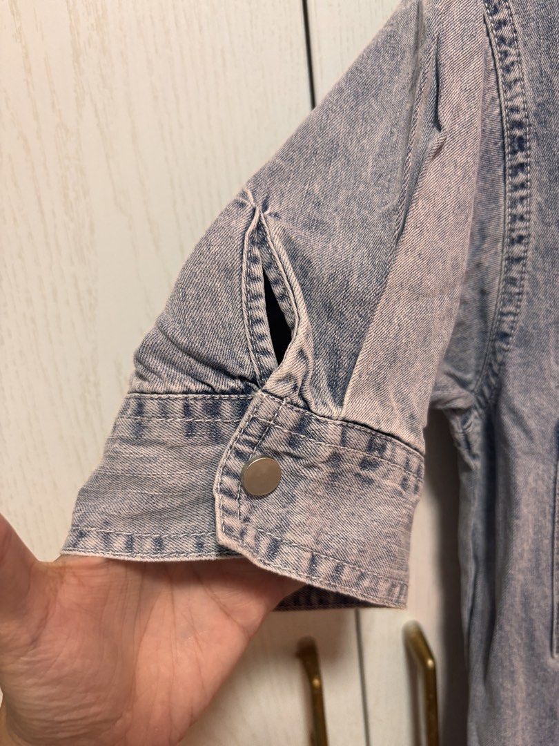 Cotton Denim Jumpsuit with Drawstring Waist (Category: Jumpsuits) located in Manila. Submitted by sophiadaphne (Listing ID 1460930991, Image 2). Description: - Stylish denim jumpsuit - Short sleeves with button detail - Adjustable drawstring waist for a perfect fit - Convenient chest and side pockets - Easy button-up front closure - Trendy frayed hem detail - Versatile for casual outings Shoulder to Hem: 53in Bust: up to 41in Waist: up to 37in.