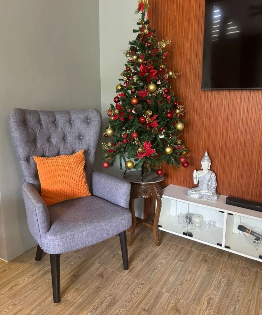 Cozy chair with coffee table (Category: Chairs) located in Caloocan City. Submitted by goodseller1003 (Listing ID 1460935850, Image 2). Description: - Stylish gray wingback accent chair - Comfortable tufted back design - Includes a vibrant orange throw pillow - Comes with a modern round coffee table - Upholstered in soft, durable fabric - Perfect for living rooms, reading nooks, or bedrooms.