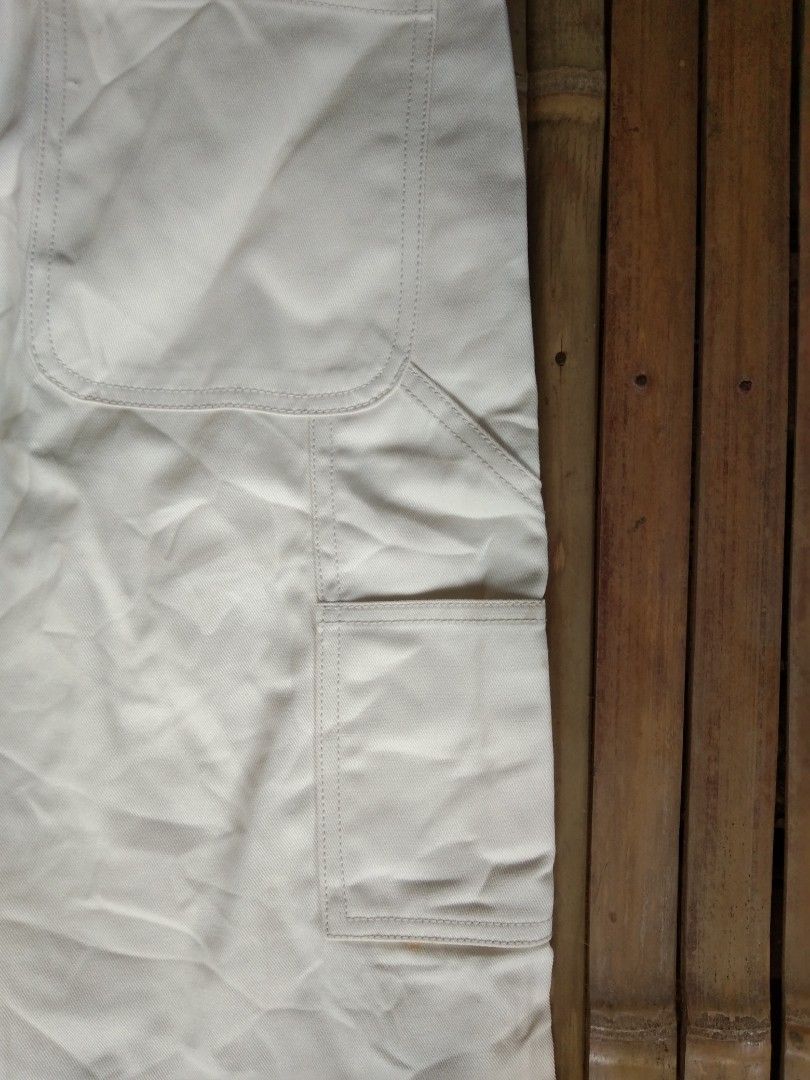 Cream carpenter jorts (Category: Shorts) located in Aloran. Submitted by ingsikthrifting (Listing ID 1460927832, Image 3). Description: Cream carpenter jorts Very excellent condition (asnew) Issue bale stain Waistline 32 Length 25 Thighs 14 Hem 12.