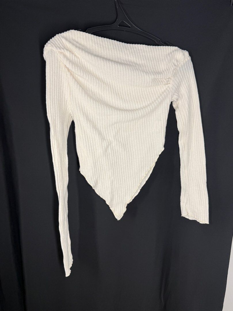 Cream Ribbed Asymmetrical Long Sleeve Top (Category: Longsleeves) located in Angeles City. Submitted by lesmiz24601 (Listing ID 1460973423, Image 3). Description: - Cream ribbed long-sleeve top - Asymmetrical hemline - Off-shoulder neckline - Stretchy material for a comfortable fit - Perfect for dressing up or down, looks great tucked in or worn out.